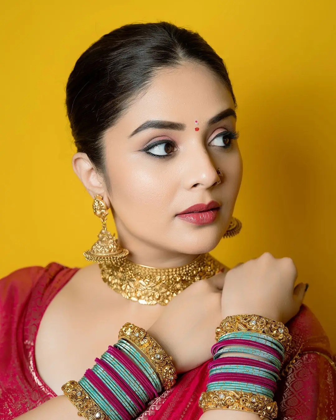 Telugu Actress Sreemukhi Stills In Green Lehenga Choli